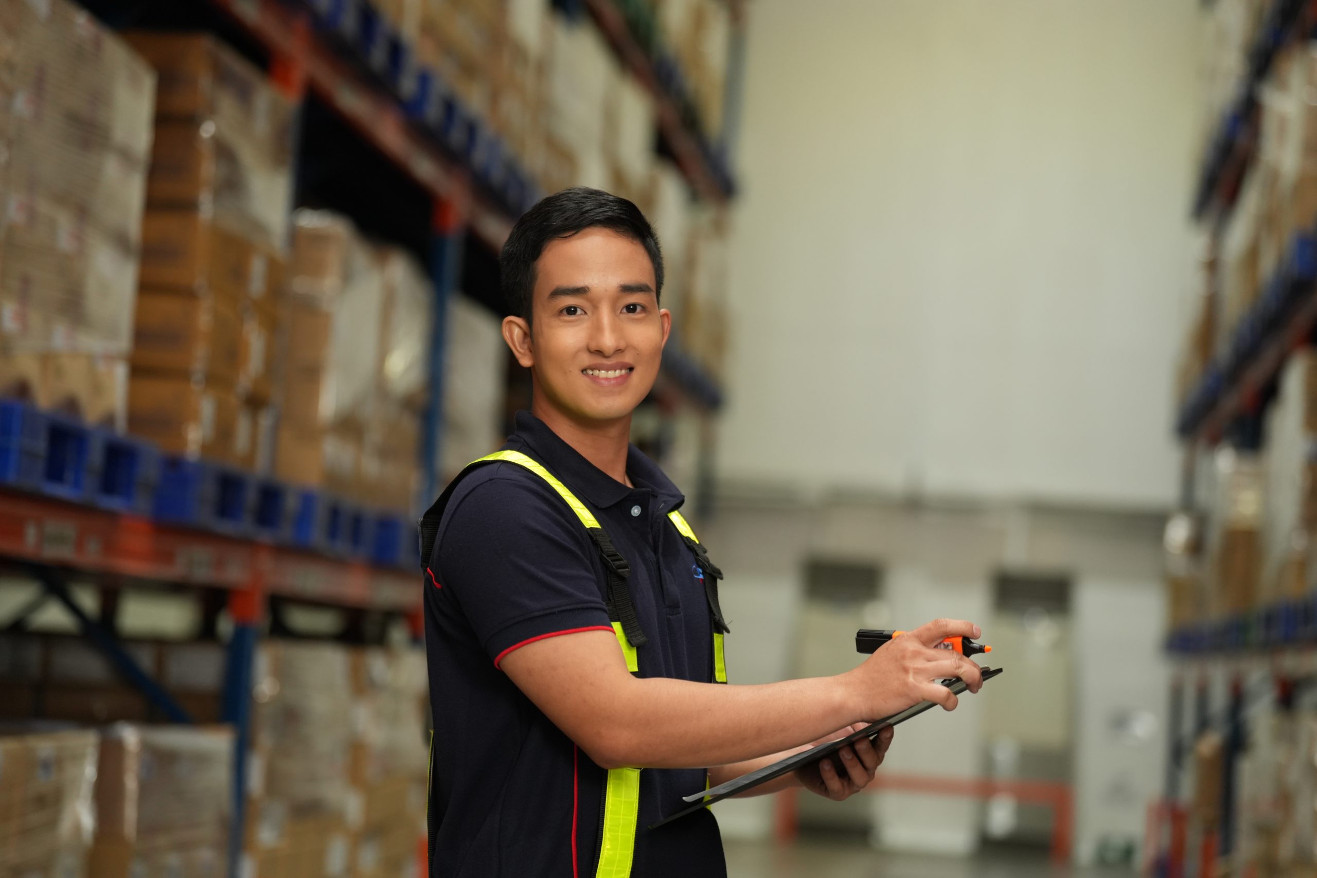 man inside a warehouse or employed in a company providing logistics solutions