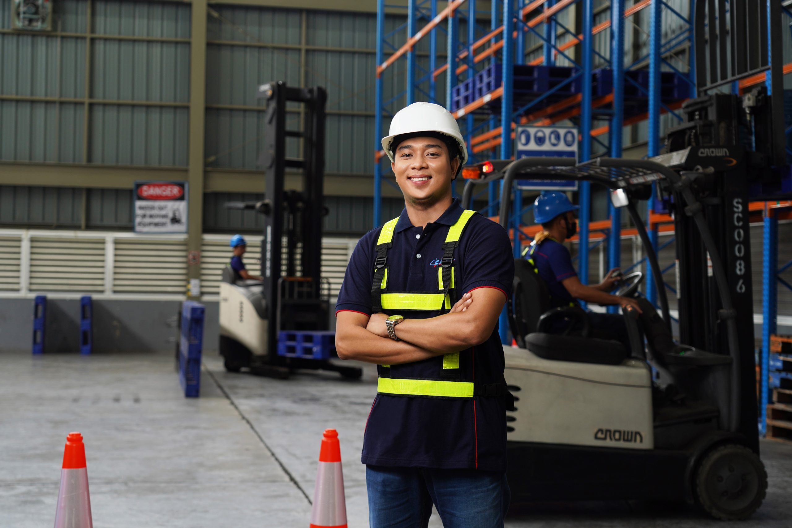 man inside a warehouse providing forklift services