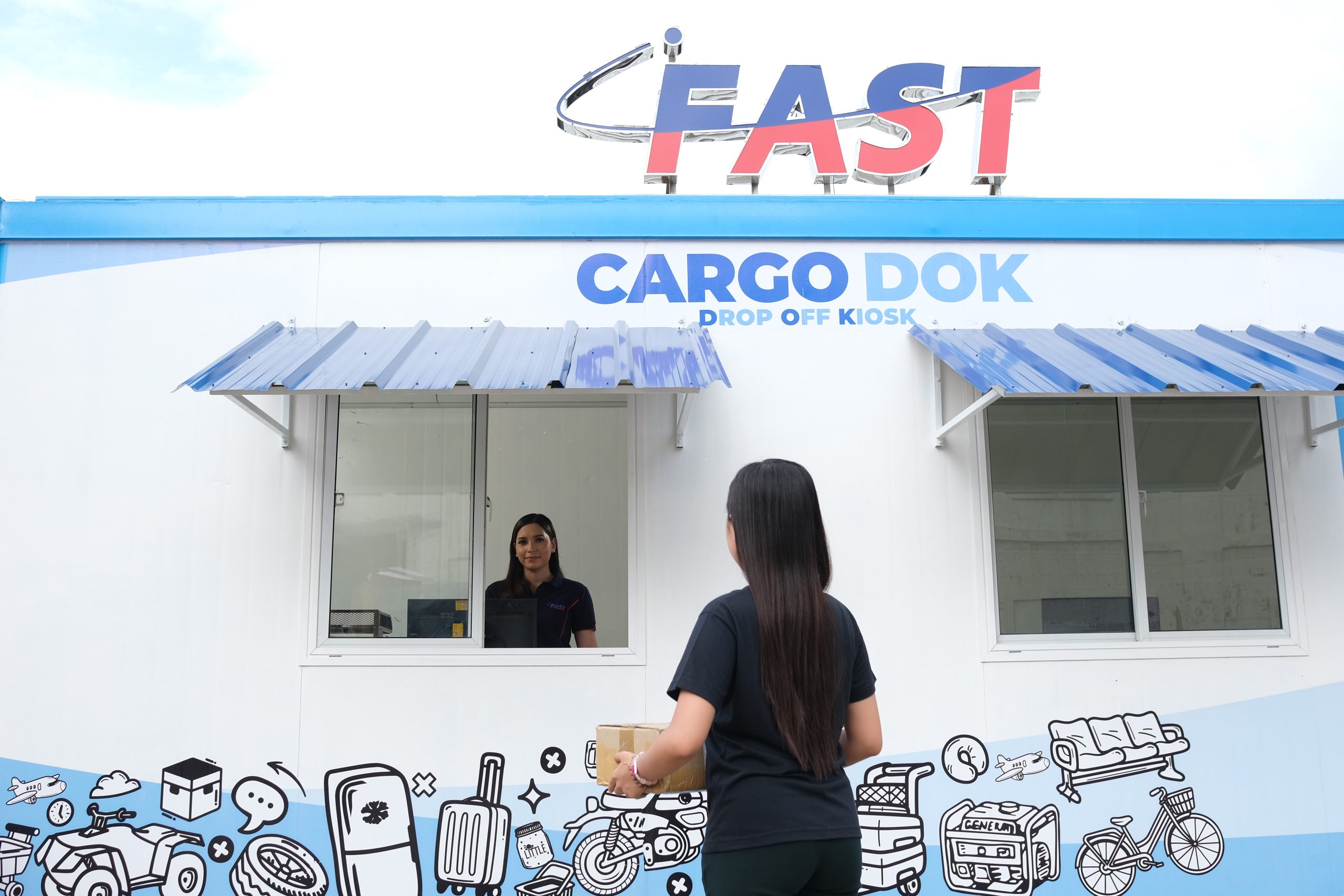 FAST employee receiving a cargo for Cebu to Davao delivery