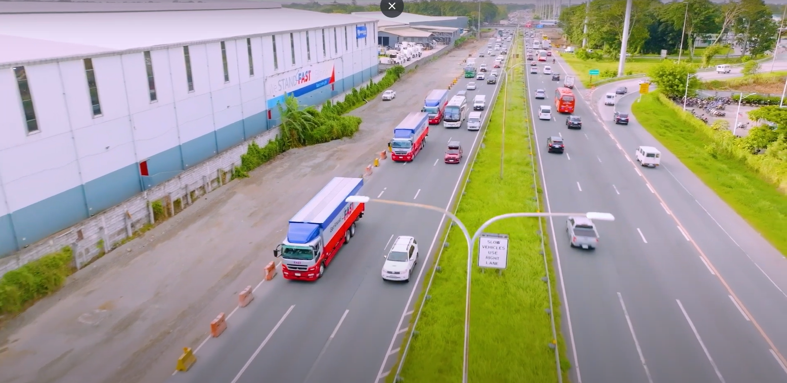 10-wheeler truck traversing a highway in the Philippines