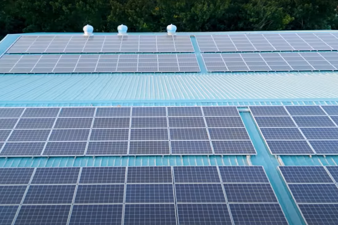 solar panels on the roof of a warehouse